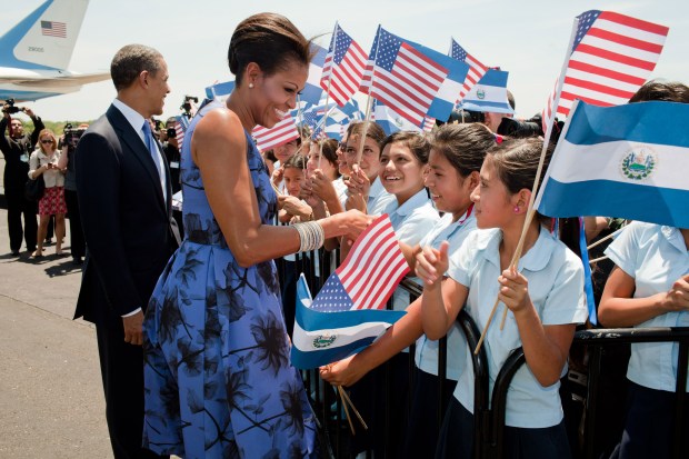 Barack_and_Michelle_Obama_greet_children_during_the_arrival_ceremony_at_Comalapa_International_Airport_in_San_Salvador,_2011